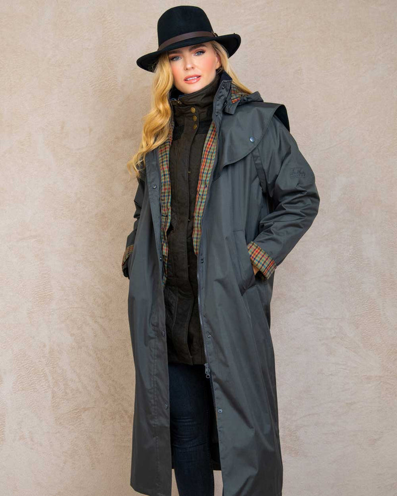 Olive coloured Jack Murphy Malvern Ladies Waterproof Bush Coat on wall background 