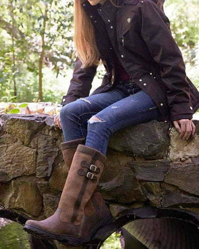 Java coloured Ariat Eskdale H20 Waterproof Boots on lake background #colour_java