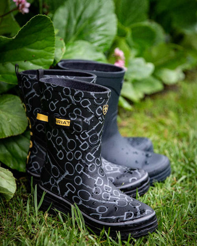 Black Bit Print coloured Ariat Womens Burford Wellington Boots on leafy background #colour_black_bit_print