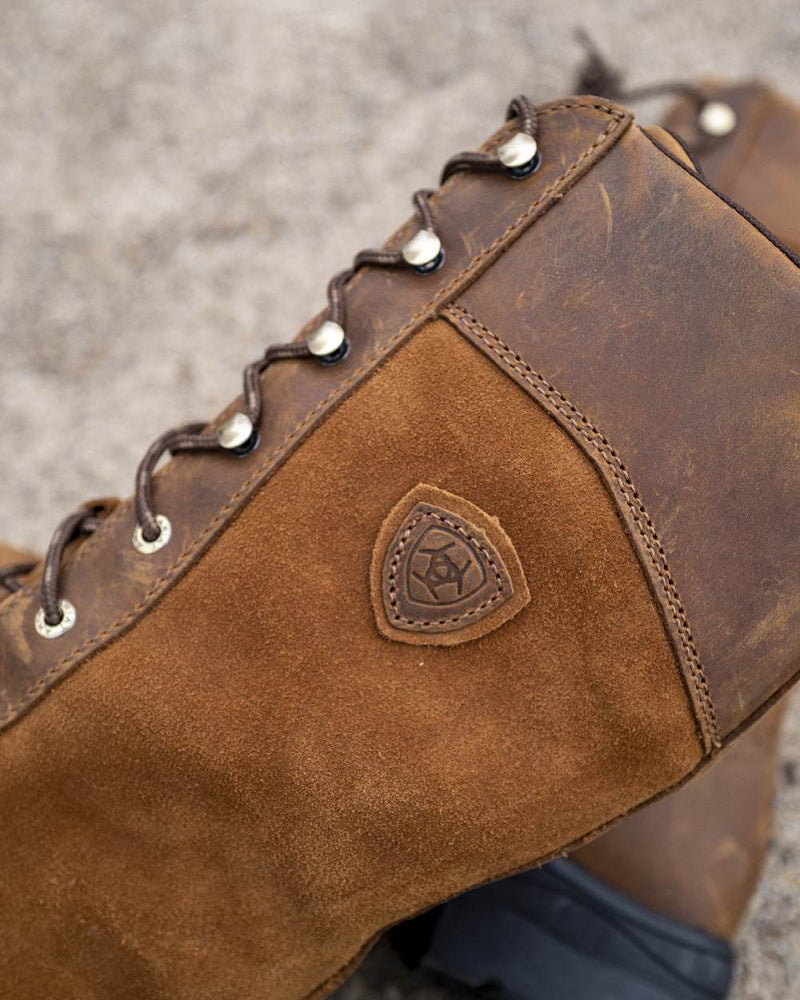 Java coloured Ariat Wythburn Insulated Waterproof Boots on blurry background 