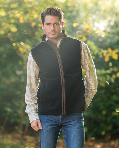 Anthracite Coloured Baleno Harvey Fleece Gilet on blurry background #colour_anthracite