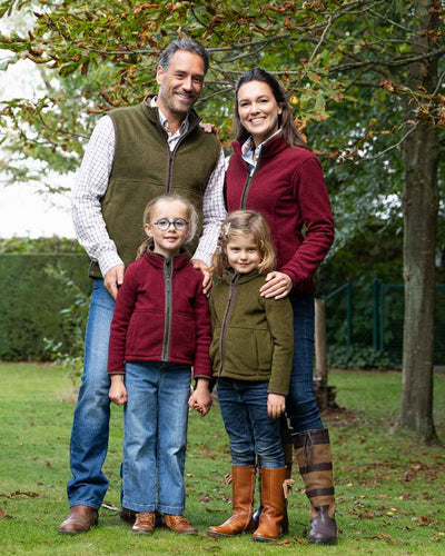 Olive Coloured Baleno Harvey Fleece Gilet on garden background #colour_olive