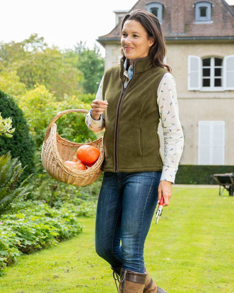 Olive coloured Baleno Sally Ladies Fleece Gilet on garden background 