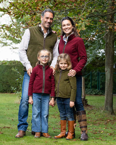 Burgundy Coloured Baleno Sarah Fleece Jacket on garden background #colour_burgundy