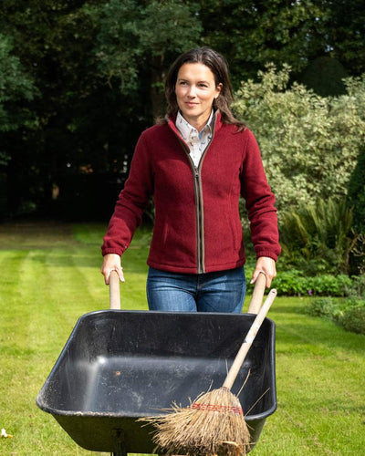 Burgundy Coloured Baleno Sarah Fleece Jacket on garden background #colour_burgundy