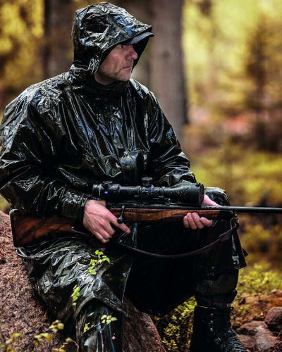 Art Green Coloured Deerhunter Hurricane Long Rain Coat on blurry background #colour_art-green