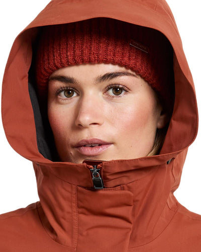 Rust coloured Didriksons Frida Womens Parka 7 on white background #colour_rust
