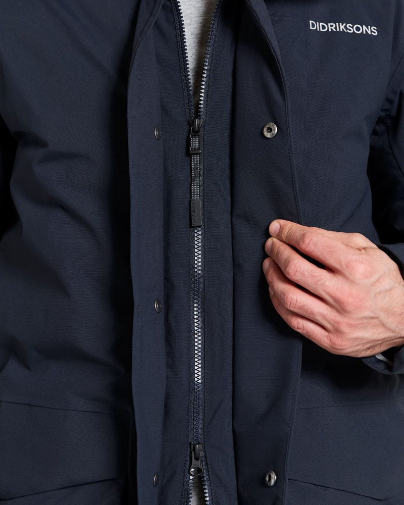 Dark Night Blue coloured Didriksons Mens Akilles Parka on white background 