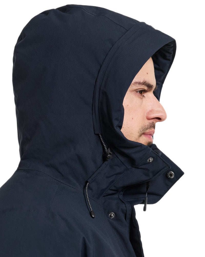 Dark Night Blue coloured Didriksons Mens Akilles Parka on white background 