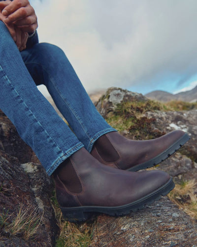 Mahogany coloured Dubarry Antrim Country Boots on rock background #colour_mahogany