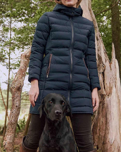 Navy coloured Dubarry Ballybrophy Quilted Jacket on tree background #colour_navy