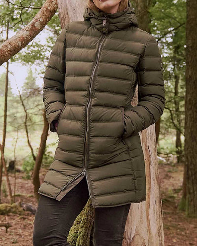 Olive coloured Dubarry Ballybrophy Quilted Jacket on tree background #colour_olive