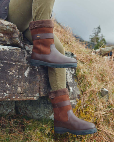 Walnut coloured Dubarry Foxrock Country Boot on grass background #colour_walnut