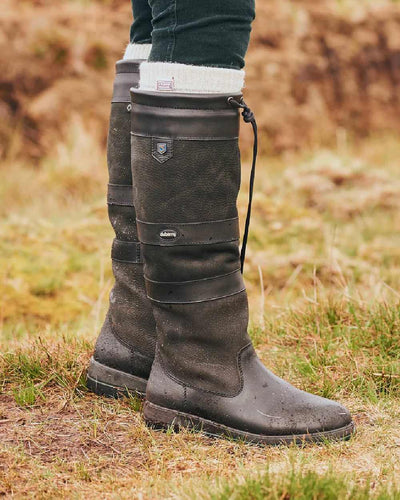 Black coloured Dubarry Galway Country Boots on grass background #colour_black