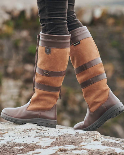 Brown coloured Dubarry Galway Country Boots on rock background #colour_brown