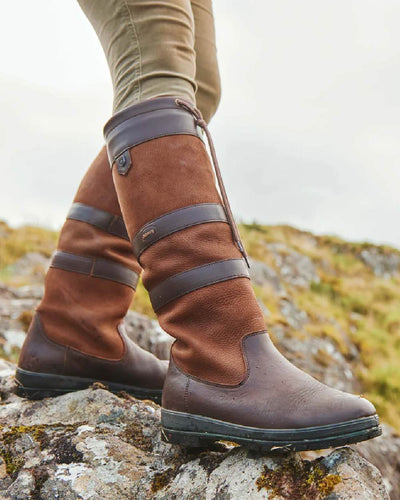 Walnut coloured Dubarry Galway Country Boots on rock background #colour_walnut