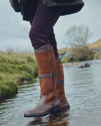 Walnut coloured Dubarry Womens Sligo Country Boots on water background #colour_walnut