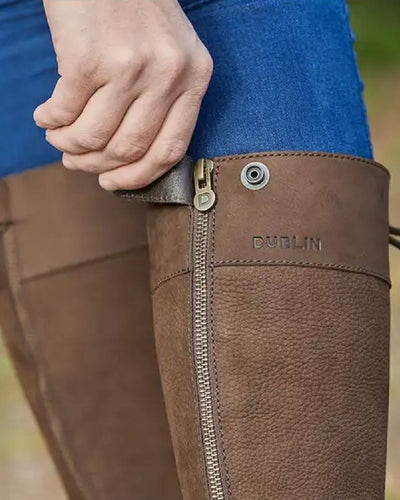 Chocolate coloured Dublin Admiral Boots on blurry background #colour_chocolate