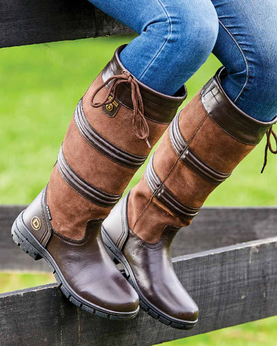 Brown coloured Dublin Husk Boots II on fence background #colour_brown