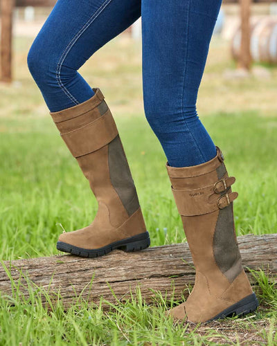 Dark Brown coloured Dublin Pollard Boots on grass background #colour_dark-brown