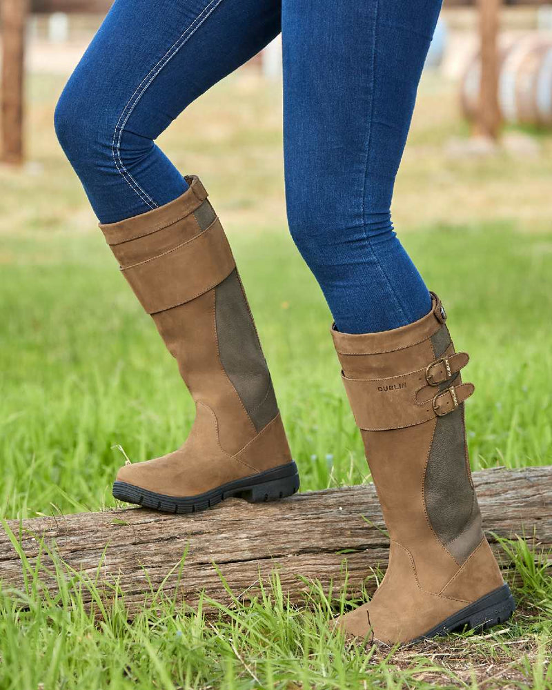 Dark Brown coloured Dublin Pollard Boots on grass background 