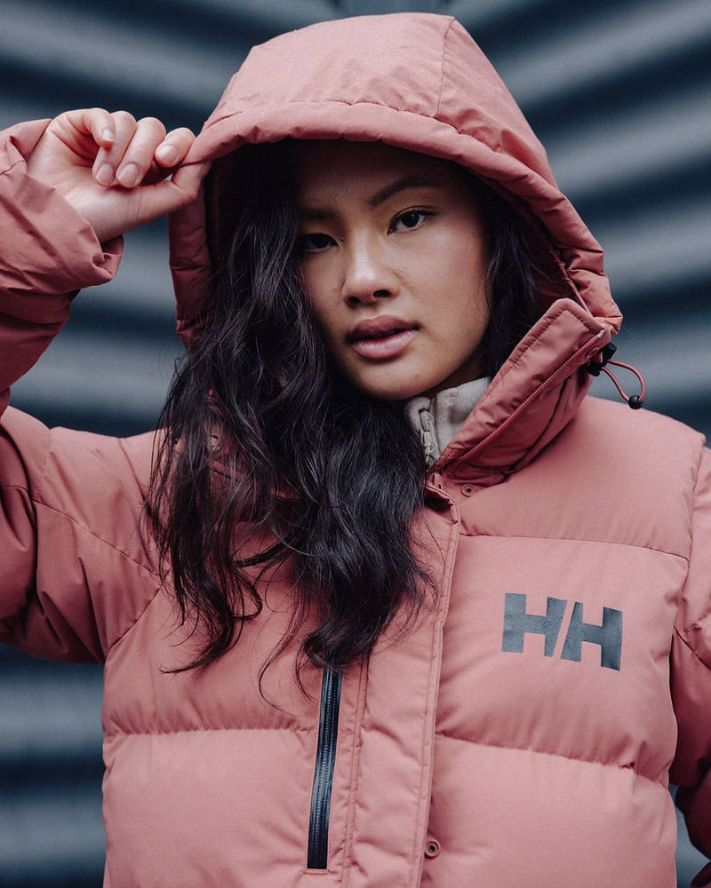 Cedarwood Coloured Helly Hansen Adore Ladies Puffy Parka on outdoor background 