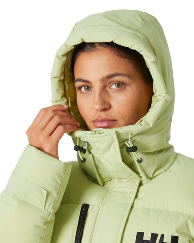 Helly Hansen Adore Ladies Puffy Parka on white background #colour_iced-matcha