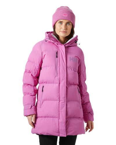 Meta Pink Coloured Helly Hansen Adore Ladies Puffy Parka on white background #colour_meta-pink