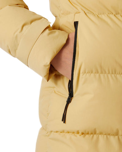 Sand Coloured Helly Hansen Adore Ladies Puffy Parka on white background #colour_sand