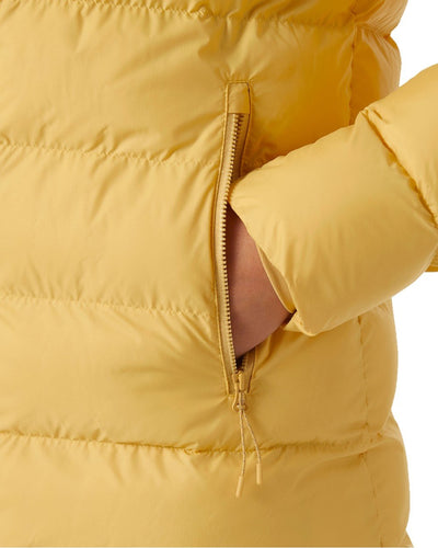 Sand Coloured Helly Hansen Womens Active Puffy Parka on white background #colour_sand