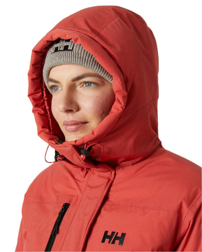 Poppy Red coloured Helly Hansen Womens Adore Helly Tech Parka on white background #colour_poppy-red