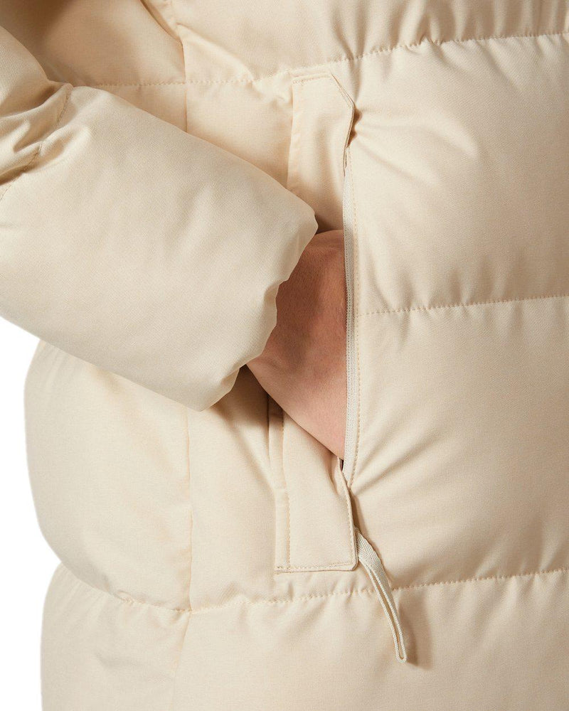 Cream Coloured Helly Hansen Womens Blossom Puffy Winter Parka on white background 