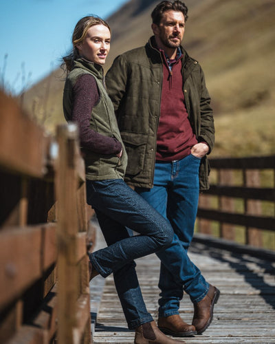 Lovat Coloured Hoggs of Fife Stenton Ladies Fleece Gilet on bridge background #colour_lovat