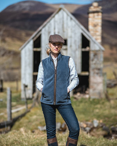 Slate Grey Coloured Hoggs of Fife Stenton Ladies Fleece Gilet on house background #colour_slate-grey