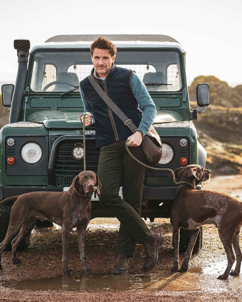 Midnight Navy coloured Hoggs of Fife Stenton Technical Fleece Gilet on car background 