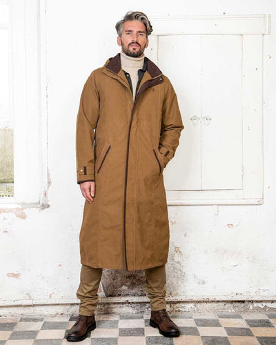 Camel Jack Murphy Emmet Waterproof Long Coat on wall background #colour_camel