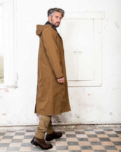 Camel Jack Murphy Emmet Waterproof Long Coat on wall background #colour_camel