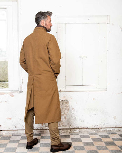 Camel Jack Murphy Emmet Waterproof Long Coat on wall background #colour_camel