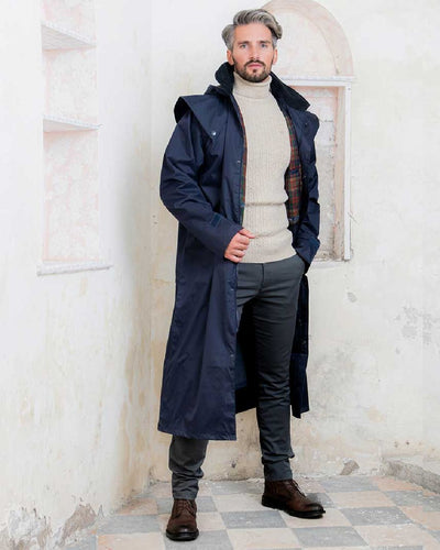 Navy coloured Jack Murphy Lambourne Mens Long Bush Coat on wall background #colour_navy