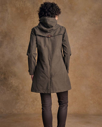 Olive coloured Jack Murphy Una 3/4 Waterproof Coat on wall background #colour_olive