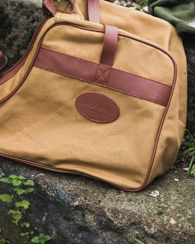 Fawn coloured Jack Pyke Canvas Walking Boot Bag on rock background #colour_fawn