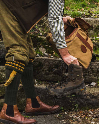 Fawn coloured Jack Pyke Canvas Walking Boot Bag on rock background #colour_fawn