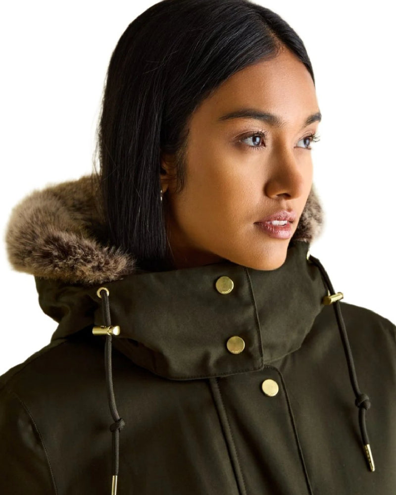 Khaki Green Coloured Joules Womens Harpsden Cosy Waterproof Fleece Lined Raincoat With Faux Fur Hood on white background 