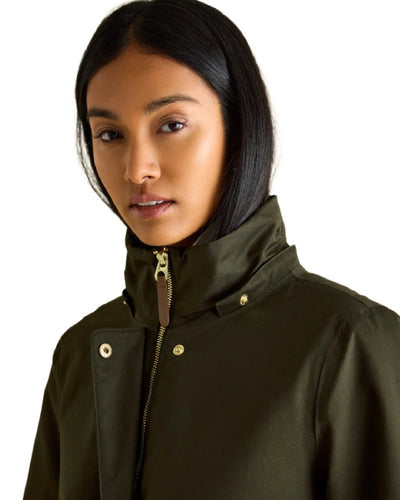 Khaki Green Coloured Joules Womens Harpsden Cosy Waterproof Fleece Lined Raincoat With Faux Fur Hood on white background #colour_khaki-green