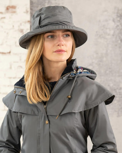 Urban Grey coloured Lighthouse Canterbury Waterproof Hat on wall background #colour_urban-grey