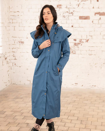 Deep Sea Lighthouse Outback Full Length Ladies Waterproof Raincoat on wall background #colour_deep-sea