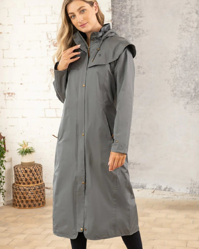 Urban Grey Lighthouse Outback Full Length Ladies Waterproof Raincoat on wall background #colour_urban-grey