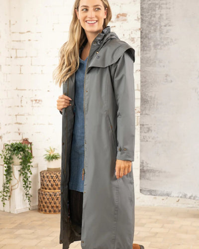 Urban Grey Lighthouse Outback Full Length Ladies Waterproof Raincoat on wall background #colour_urban-grey