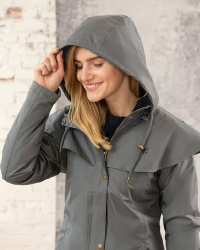 Urban Grey coloured Lighthouse Outrider 3-4 Length Ladies Waterproof Raincoat - Clearance Colours on wall background #colour_urban-grey