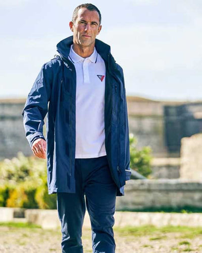 Navy coloured Musto Sardinia Long Rain Jacket on sky background #colour_navy